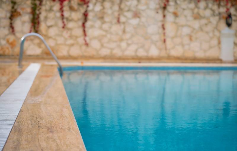 abstractblurbackgroundoutdoorswimmingpoolrainyweatherrainyseasonblursummerbackgroundresorthotelpoolpartyminjpg 63c1273a4a757