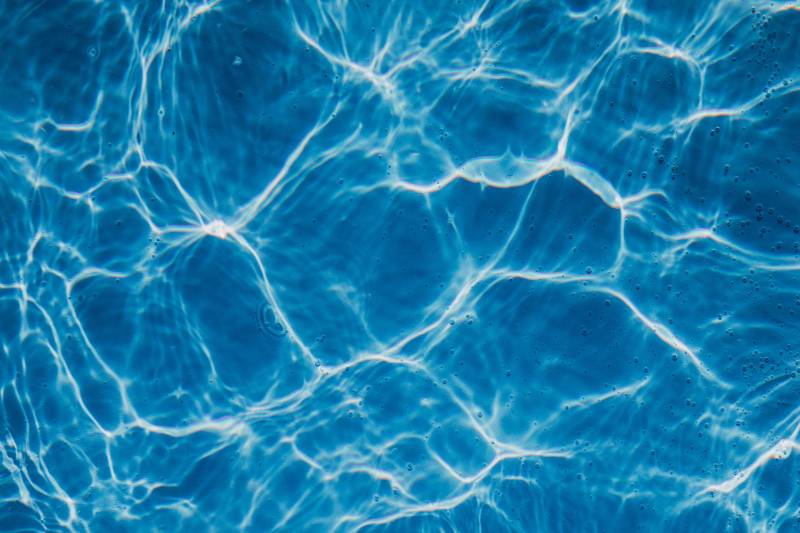 highanglecloseupshotcrystalclearswimmingpoolwaterminjpg 63f8b78da93c1